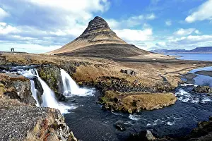 Pyramid: Kirkjufellsfoss waterfall and Kirkjufell mountain