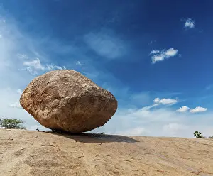 Tamil: Krishna's butterball, balancing giant natural ro