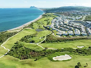 Gibraltar: The La Hacienda Links Golf Resort at the Mediterranean Sea with the Rock of Gibraltar (British) in the distance