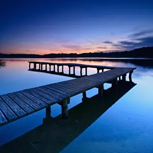 Lakeland: Lake with footbridge after sunset, Lake Dambeck
