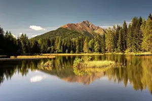 Pristine: Lake Schattensee with water reflection, behind mountain