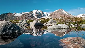 Altai: Lake with snow-covered Altai mountains in the back