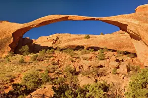 Spanning: Landscape Arch - sandstone spanning rocky landscape