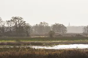 Beacon: Landscape with church tower of Rolde in autumn