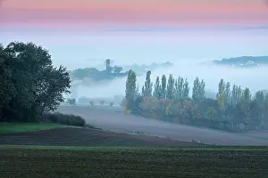 Thuringia: Landscape in North Hesse, morning fog and dawn red