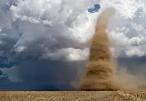 Funnel: A landspout tornado grinds across western Kansas