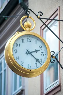 Shop: Large pocket watch sign, Miltenberg, Germany