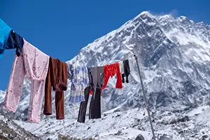 Drying: Laundry drying on a clothesline, in the background