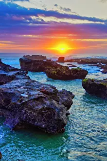Wave: Lava Rock outcroppings in the shallow seas at Cemagi Beach