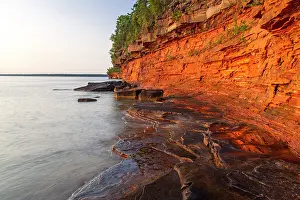 Devils: Layered sandstone cliffs and sea caves at