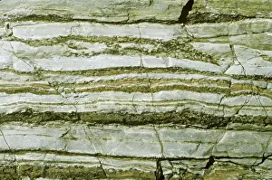 Stratification: Layers of limestone and sandstone