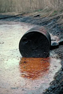 Super: Leaking oil drum