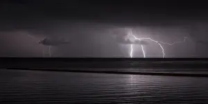 Lithuania: Lightning above a lagoon, Lithuania, Klaipeda