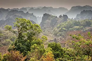 Motorcycle: Limestone Peaks Lookout and misty mountain views, K