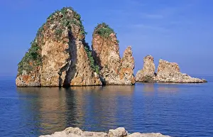 Silence: Limestone rock stacks stand in blue Tyrrhenian sea