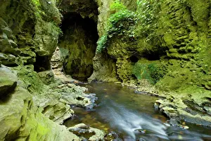 Tunnels: Limestone Tunnel - river flows through a deep and