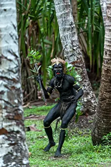 Tribal: Local Dancer man painted with black paint performing