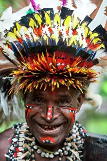 Tribal: Local Dancer man wearing traditional headdress