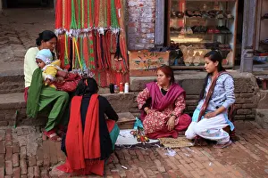 Selling: Local Woman in old town