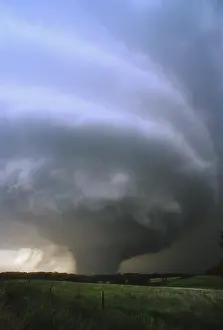 Severe: A lone lightning bolt strikes the ground beneath
