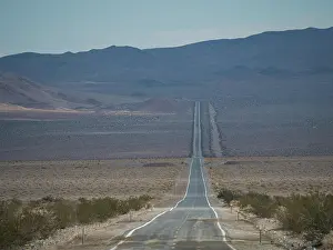 Mojave: Lonely long road through desert landscape, Highway
