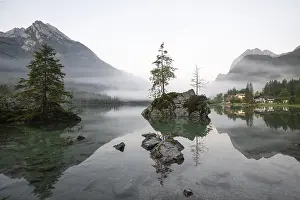Misty: Magical sunrise with fog at Hintersee near Ramsau in Berchtesgadener Land
