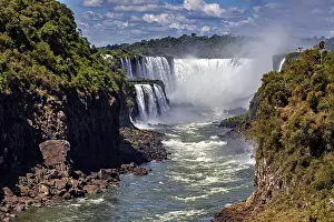 Waterfalls: Majestic waterfalls with strong flow and spray