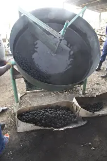 Recycling: Making charcoal balls from charcoal dust drying