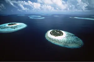 Reefs: MALDIVES - aerial of coral reefs and Atolls