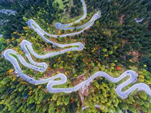 Connection: Maloja Pass, winding Swiss Alpine pass, drone photo
