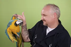 Ararauna: Man with His Blue-and-Gold Macaw