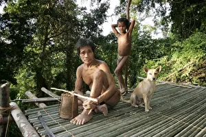 Peoples: Man and boy on a platform Tau't Batu Palawan