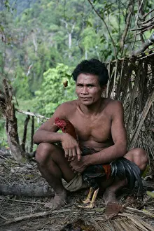 Peoples: Man and cock Tau't Batu Palawan Philippines