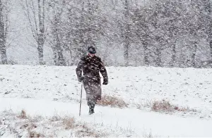 Storms: MAN IN SNOW STORM
