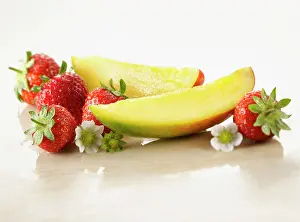 Arranged: Mango, Mangifera indica. Two slices arranged with
