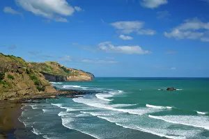 Maori: Maori Bay - waves rolling ashore the black sand