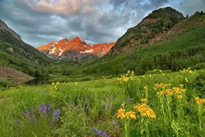 Bells: Maroon Bells reflect into calm Maroon Lake