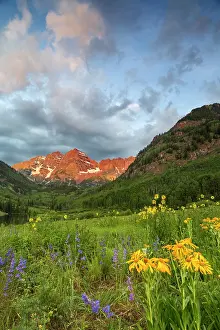 Bells: Maroon Bells reflect into calm Maroon Lake