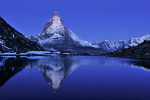 Riffelsee: Matterhorn with reflection Riffelsee at night before sunrise