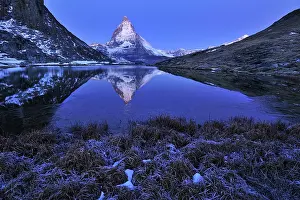 Riffelsee: Matterhorn with reflection Riffelsee at night before sunrise