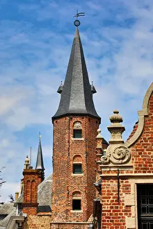 Brugge: Medievel tower and traditional roof decorations