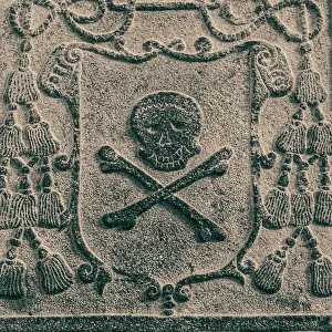 Death: Melaka, West Malaysia. Skull and crossbones stone