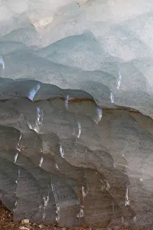 Retreat: Melting glacier ice in an ice cave of the