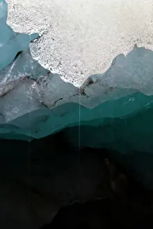 Retreat: Melting glacier ice in an ice cave of the