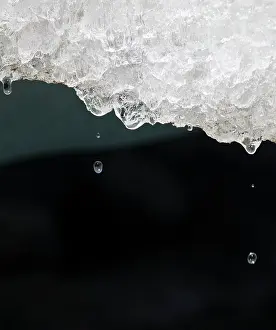 Retreat: Melting glacier ice in an ice cave of the