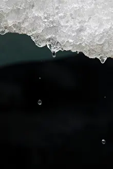 Retreat: Melting glacier ice in an ice cave of the