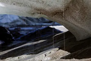 Retreat: Melting glacier ice in an ice cave of the