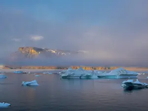 Fjord: Midnight sun at Storoen Island. Landscape in the Uummannaq
