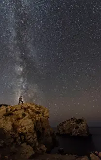 Endless: Milky Way with man standing on the edge