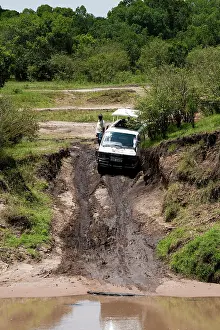 Stuck: Minibus stuck in mud, Maasai Mara, Kenya